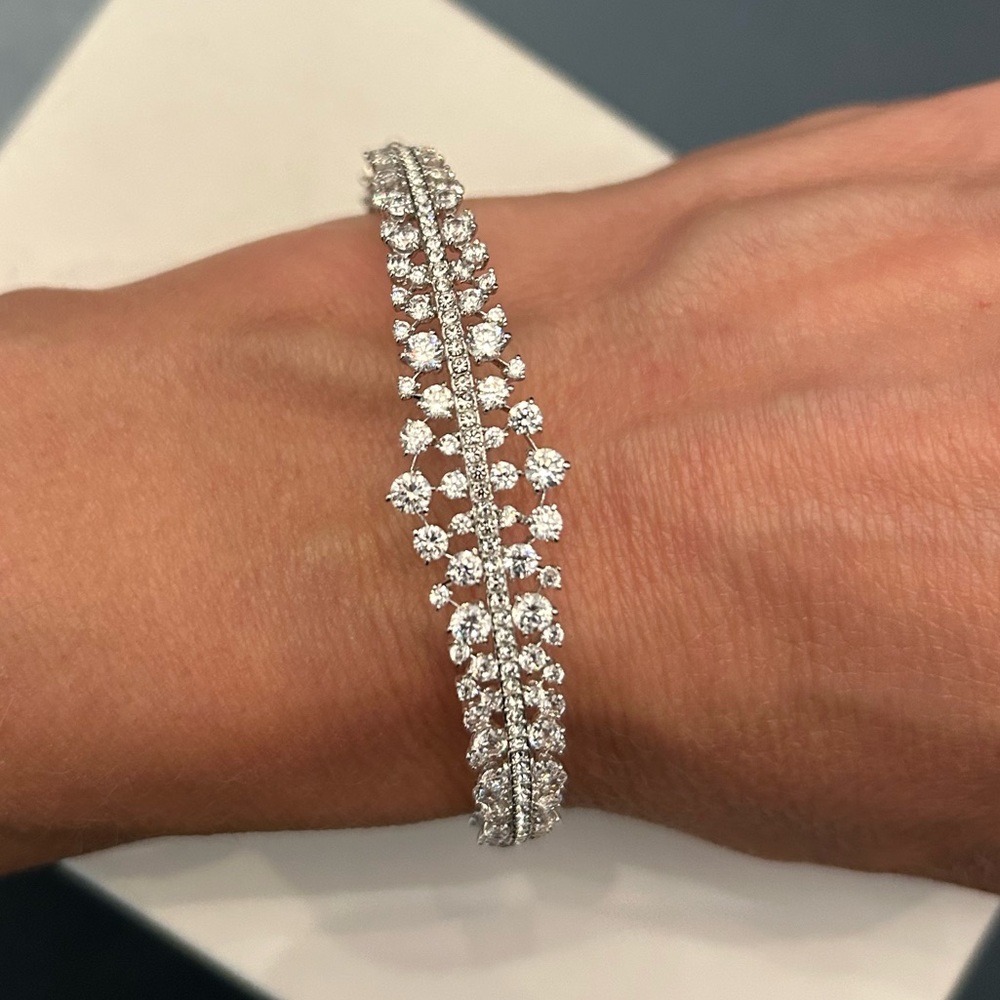 BNWT ADRIANA ORSINI Cubic Zirconia Rhodium Plated Hinge-Closure Bangle